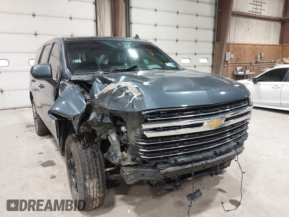 2021 Chevrolet Tahoe LT z VIN 1GNSKNKD5MR354265, wystawiony jako IAAI lot #42331890 z przebiegiem 106 250 mil mil oraz . Historia ofert i sprzedaży dostępna na DreamBid. Obrazek 6.