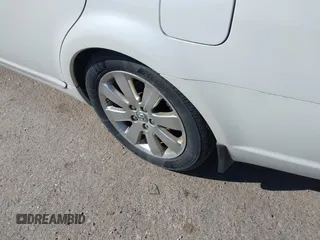 2007 Toyota Avalon XL z VIN 4T1BK36B07U220489, wystawiony jako IAAI lot #42332158 z przebiegiem 157 534 mil mil oraz . Historia ofert i sprzedaży dostępna na DreamBid. Obrazek 14.