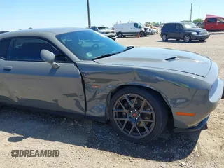 2018 Dodge Challenger R/T with VIN 2C3CDZBT2JH146463, listed as a IAAI auction lot 41973692 with 49,913 mi miles and . Bid and sale history available at DreamBid. Image 6.