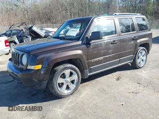 2014 Jeep Patriot High Altitude with VIN 1C4NJPFA7ED851059, listed as a IAAI auction lot 41306629 with 156,270 mi miles and . Bid and sale history available at carsss.com. Image 2.