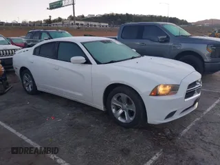 2013 Dodge Charger SE with VIN 2C3CDXBG1DH539849, listed as a IAAI auction lot 41673743 with 191,665 mi miles. Bid and sale history available at carsss.com. Image 1.