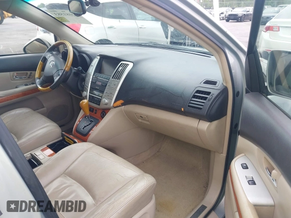 2006 Lexus RX 400h with VIN JTJHW31U462004373, listed as a IAAI auction lot 42081583 with 294,827 mi miles and . Bid and sale history available at DreamBid. Image 5.