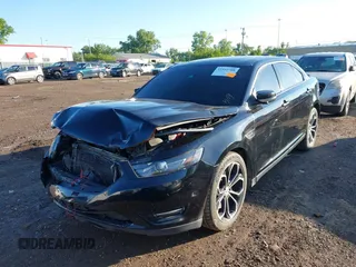2016 Ford Taurus SHO z VIN 1FAHP2KT4GG140142, wystawiony jako IAAI lot #42332708 z przebiegiem 104 670 mil mil oraz . Historia ofert i sprzedaży dostępna na DreamBid. Obrazek 2.