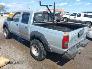 2001 Nissan Frontier SE z VIN 1N6ED27T11C371123, wystawiony jako IAAI lot #41874917 z przebiegiem 291 582 mil mil oraz . Historia ofert i sprzedaży dostępna na DreamBid. Obrazek 3.