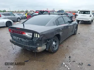 2013 Dodge Charger Police z VIN 2C3CDXAT4DH521778, wystawiony jako IAAI lot #42169438 z przebiegiem 191 907 mil mil oraz . Historia ofert i sprzedaży dostępna na DreamBid. Obrazek 4.