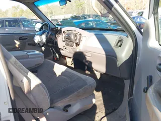 1999 Ford F-150 with VIN 1FTZX1728XNA81813, listed as a IAAI auction lot 41367154 with 149,103 mi miles and . Bid and sale history available at DreamBid. Image 5.