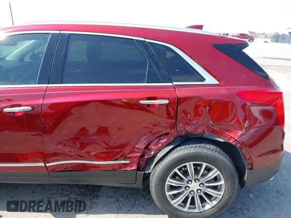 2017 Cadillac XT5 Luxury FWD z VIN 1GYKNBRS4HZ151581, wystawiony jako IAAI lot #42043322 z przebiegiem 120 598 mil mil oraz . Historia ofert i sprzedaży dostępna na DreamBid. Obrazek 6.