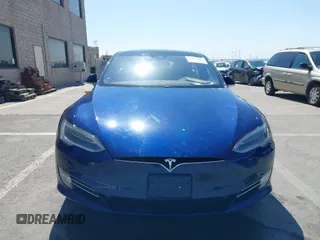 2016 Tesla Model S 90D with VIN 5YJSA1E25GF157220, listed as a IAAI auction lot 42003019 with 130,540 mi miles and . Bid and sale history available at DreamBid. Image 12.