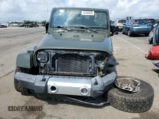 2015 Jeep Wrangler Unlimited Wrangler X with VIN 1C4BJWEG4FL754492, listed as a Copart auction lot 55305825 with 108,078 mi miles and Salvage title. Bid and sale history available at DreamBid. Image 5.