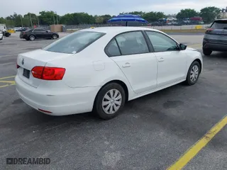 2014 Volkswagen Jetta Sedan S with VIN 3VW2K7AJ8EM375364, listed as a IAAI auction lot 41879370 with 117,259 mi miles. Bid and sale history available at carsss.com. Image 4.