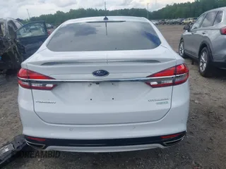 2017 Ford Fusion Titanium z VIN 3FA6P0K93HR203063, wystawiony jako IAAI lot #42243064 z przebiegiem 176 078 mil mil oraz . Historia ofert i sprzedaży dostępna na DreamBid. Obrazek 17.