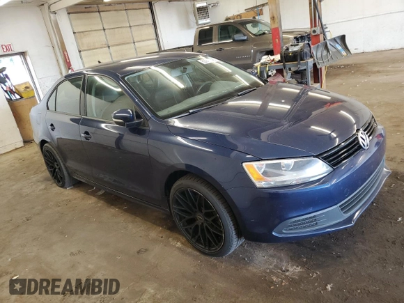 2014 Volkswagen Jetta SE with VIN 3VWD17AJ7EM428230, listed as a Copart auction lot 63944345 with 166,370 mi miles and Clean title. Bid and sale history available at DreamBid. Image 4.