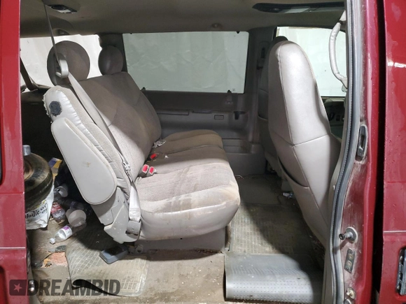 2004 Chevrolet Astro z VIN 1GNEL19X74B127199, wystawiony jako Copart lot #73361264 z przebiegiem Nie podano mil oraz Szkoda całkowita • Salvage title. Historia ofert i sprzedaży dostępna na DreamBid. Obrazek 11.