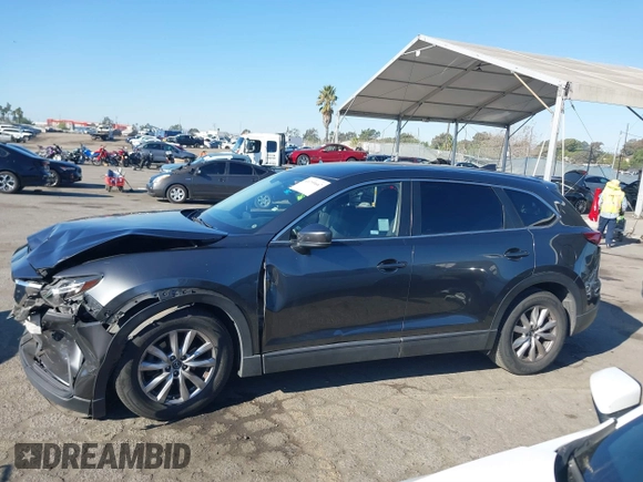 2017 Mazda CX-9 Sport with VIN JM3TCABY4H0128483, listed as a IAAI auction lot 41299667 with 142,343 mi miles and . Bid and sale history available at DreamBid. Image 14.
