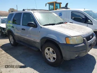 2002 Ford Escape XLT with VIN 1FMCU03142KA38985, listed as a IAAI auction lot 42663989 with 152,626 mi miles and . Bid and sale history available at DreamBid. Image 1.