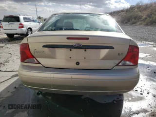 2000 Ford Focus LX with VIN 1FAFP33P8YW381773, listed as a Copart auction lot 80168174 with 151,410 mi miles and Salvage Title. Bid and sale history available at DreamBid. Image 6.