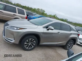 2022 Lexus RX 350 with VIN 2T2AZMDA7NC352957, listed as a IAAI auction lot 42297457 with 34,576 mi miles and . Bid and sale history available at DreamBid. Image 14.