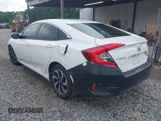 2017 Honda Civic LX with VIN 19XFC2F58HE010262, listed as a IAAI auction lot 42118124 with 125,535 mi miles and . Bid and sale history available at DreamBid. Image 3.