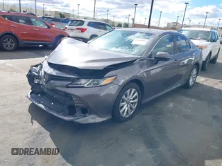 2020 Toyota Camry LE with VIN 4T1C11AK3LU363417, listed as a IAAI auction lot 41430382 with 130,837 mi miles. Bid and sale history available at carsss.com. Image 18.