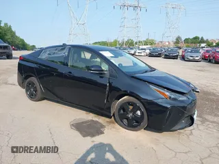 2022 Toyota Prius L Eco z VIN JTDKAMFU0N3167830, wystawiony jako IAAI lot #42391848 z przebiegiem 64 757 mil mil oraz . Historia ofert i sprzedaży dostępna na DreamBid. Obrazek 1.