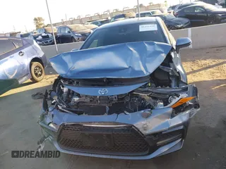 2022 Toyota Corolla SE with VIN JTDS4MCE9NJ082078, listed as a IAAI auction lot 41291406 with 57,202 mi miles and . Bid and sale history available at DreamBid. Image 12.