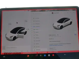 2020 Tesla Model 3 Standard Range Plus with VIN 5YJ3E1EA5LF613002, listed as a IAAI auction lot 42129085 with 55,672 mi miles. Bid and sale history available at carsss.com. Image 7.