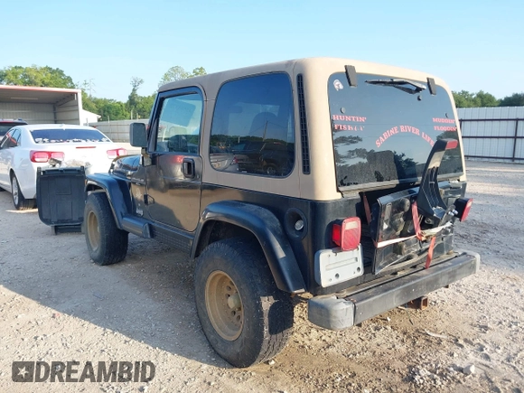 2000 Jeep Wrangler Sahara with VIN 1J4FA59SXYP718029, listed as a IAAI auction lot 42583372 with 260,811 mi miles and . Bid and sale history available at DreamBid. Image 3.