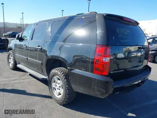 2007 Chevrolet Suburban LT with VIN 3GNFC16077G248080, listed as a IAAI auction lot 41289912 with 129,622 mi miles. Bid and sale history available at carsss.com. Image 3.