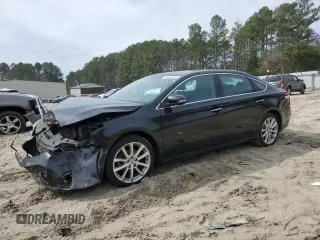 2014 Toyota Avalon Limited with VIN 4T1BK1EB5EU134727, listed as a Copart auction lot 49963195 with 57,083 mi miles and Salvage Title. Bid and sale history available at carsss.com. Image 1.