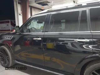2014 Infiniti QX80 with VIN JN8AZ2NF2E9555963, listed as a IAAI auction lot 41894699 with 143,255 mi miles. Bid and sale history available at carsss.com. Image 14.