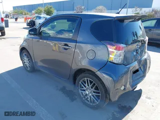 2012 Scion iQ with VIN JTNJJXB00CJ009265, listed as a IAAI auction lot 41742947 with 95,857 mi miles. Bid and sale history available at carsss.com. Image 3.
