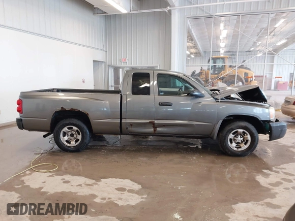 2005 Dodge Dakota ST with VIN 1D7HE22KX5S108948, listed as a IAAI auction lot 41588626 with 149,594 mi miles and . Bid and sale history available at DreamBid. Image 12.