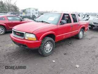 2001 GMC Sonoma SLS with VIN 1GTDT13W81K257489, listed as a IAAI auction lot 41678985 with 146,026 mi miles. Bid and sale history available at carsss.com. Image 2.