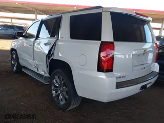 2016 Chevrolet Tahoe LTZ with VIN 1GNSKCKC4GR359442, listed as a IAAI auction lot 41871814 with 158,533 mi miles. Bid and sale history available at carsss.com. Image 3.