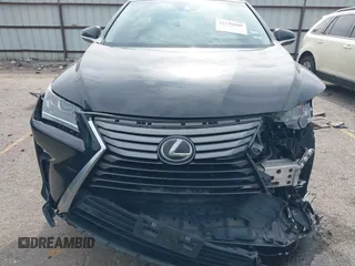 2018 Lexus RX 350 z VIN 2T2ZZMCA1JC103844, wystawiony jako IAAI lot #42138509 z przebiegiem 118 754 mil mil oraz . Historia ofert i sprzedaży dostępna na DreamBid. Obrazek 13.