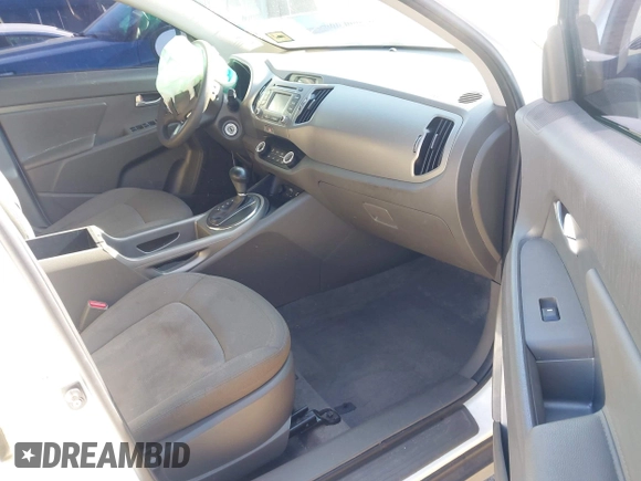 2013 Kia Sportage LX with VIN KNDPB3A25D7538328, listed as a IAAI auction lot 41989605 with 101,064 mi miles. Bid and sale history available at carsss.com. Image 5.