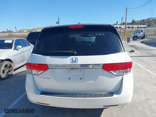 2016 Honda Odyssey EX-L with VIN 5FNRL5H65GB055916, listed as a IAAI auction lot 41980339 with 87,497 mi miles. Bid and sale history available at carsss.com. Image 16.