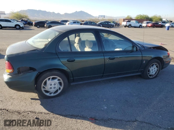 1996 Saturn SL with VIN 1G8ZK5272TZ137198, listed as a Copart auction lot 72446614 with 99,586 mi miles and Salvage title. Bid and sale history available at DreamBid. Image 3.