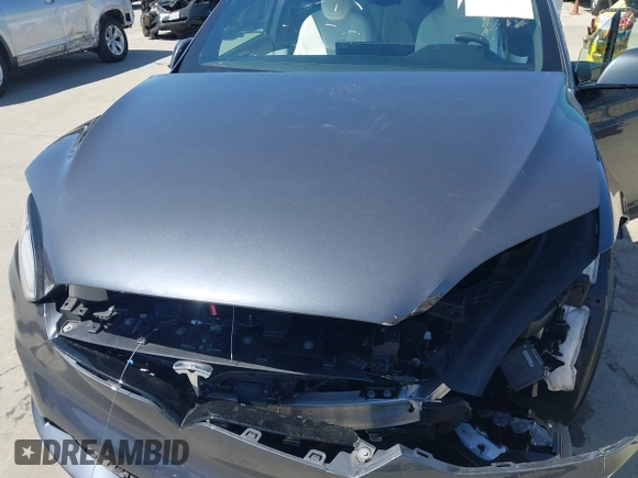 2022 Tesla Model X with VIN 7SAXCAE59NF360301, listed as a IAAI auction lot 41945059 with Not Provided miles and . Bid and sale history available at DreamBid. Image 10.