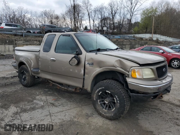 2002 Ford F-150 XL with VIN 1FTRX08L12KA41875, listed as a Copart auction lot 64756525 with 221,793 mi miles and Non repairable. Bid and sale history available at DreamBid. Image 4.