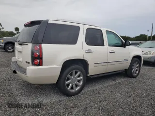 2014 GMC Yukon Denali with VIN 1GKS2EEF0ER102970, listed as a Copart auction lot 73739364 with 125,312 mi miles and Non Repairable. Bid and sale history available at carsss.com. Image 3.