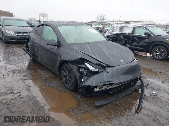 2025 Tesla Model Y Long Range with VIN 7SAYGDED6SF226035, listed as a IAAI auction lot 41102115 with Not Provided miles and . Bid and sale history available at DreamBid. Image 6.