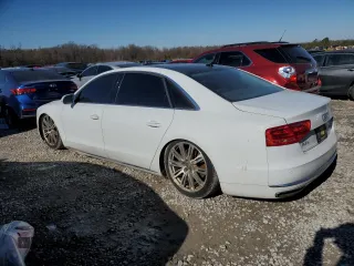 2014 Audi A8 4.0T with VIN WAUR2AFD9EN004542, listed as a Copart auction lot 88472135 with 75,909 mi miles and Salvage Title. Bid and sale history available at DreamBid. Image 2.
