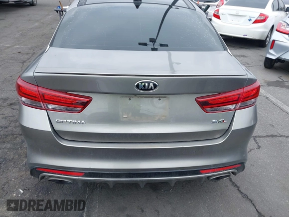 2017 Kia Optima SX Limited z VIN 5XXGV4L20HG169787, wystawiony jako IAAI lot #42194580 z przebiegiem 89 035 mil mil oraz . Historia ofert i sprzedaży dostępna na DreamBid. Obrazek 16.