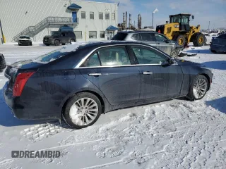 2015 Cadillac CTS Luxury AWD with VIN 1G6AX5SX5F0142864, listed as a Copart auction lot 44492445 with 87,199 mi miles and Salvage Title. Bid and sale history available at DreamBid. Image 3.
