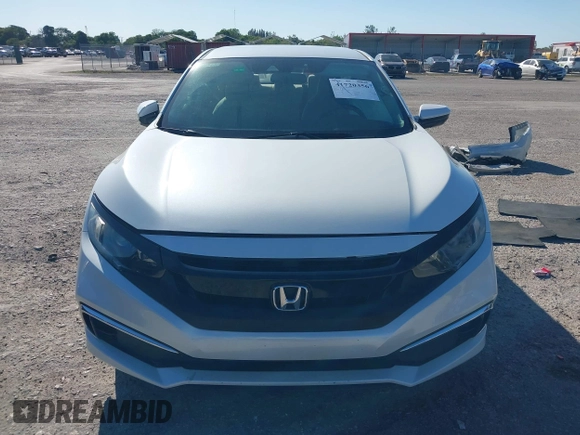 2020 Honda Civic LX z VIN 19XFC2F68LE206395, wystawiony jako IAAI lot #41720356 z przebiegiem 38 037 mil mil oraz . Historia ofert i sprzedaży dostępna na DreamBid. Obrazek 13.