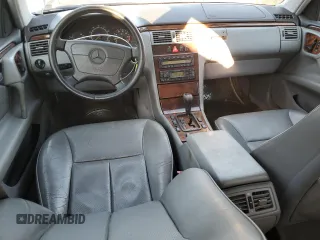 1999 Mercedes-Benz E-Class with VIN WDBJF65H8XA734585, listed as a Copart auction lot 79141194 with 196,908 mi miles and Salvage Title. Bid and sale history available at carsss.com. Image 8.