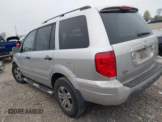 2005 Honda Pilot EX-L with RES with VIN 5FNYF186X5B062577, listed as a IAAI auction lot 42018093 with 209,321 mi miles. Bid and sale history available at carsss.com. Image 3.