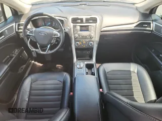 2017 Ford Fusion Hybrid SE with VIN 3FA6P0LU9HR356534, listed as a Copart auction lot 63660315 with 121,195 mi miles and Clean title. Bid and sale history available at DreamBid. Image 8.