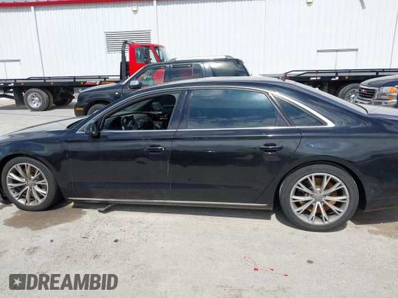 2012 Audi A8 L with VIN WAURVAFD5CN038949, listed as a IAAI auction lot 41914575 with 85,634 mi miles. Bid and sale history available at carsss.com. Image 14.